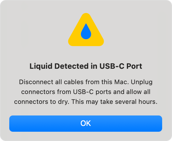 Contoh amaran macOS Liquid Detected in USB-C Port