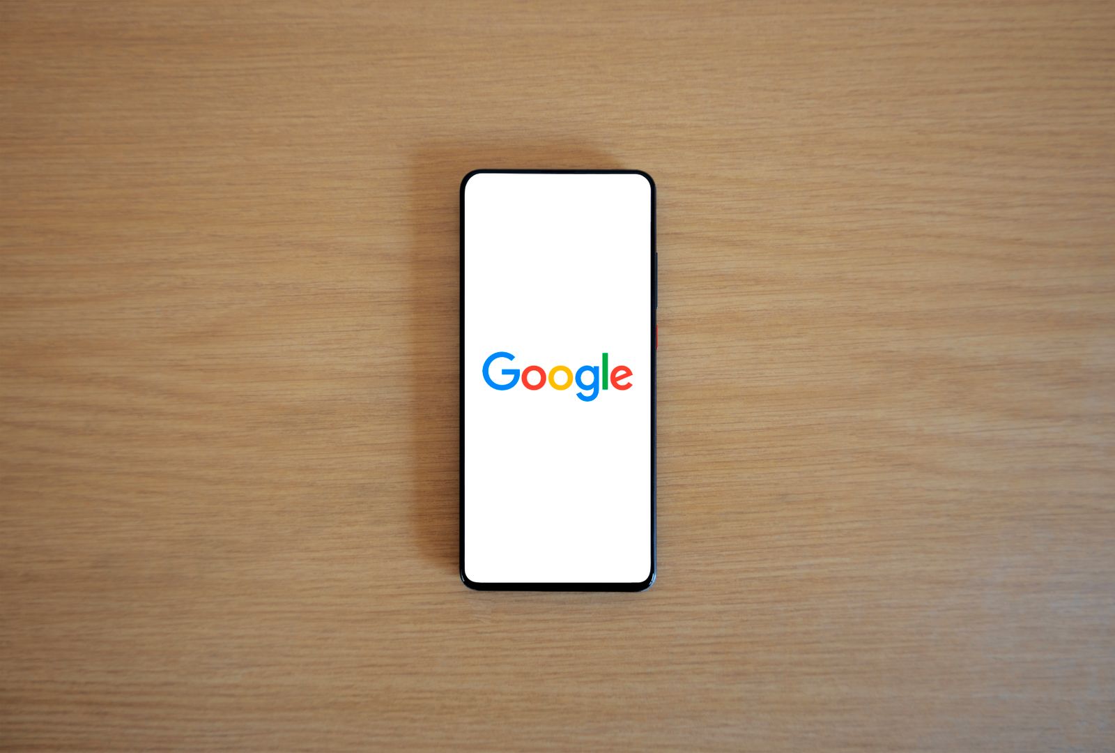 Telefon memaparkan halaman carian Google
